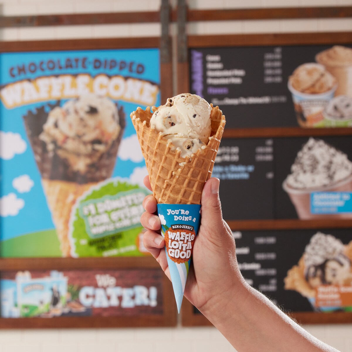 Hand holding a cone