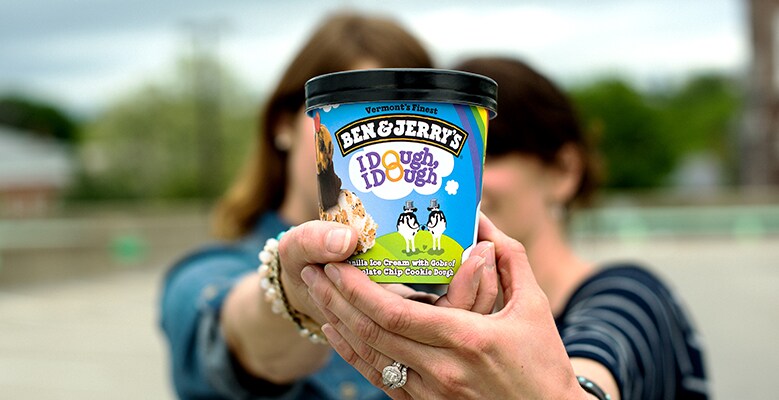 two people holding a pint of I Dough, I Dough