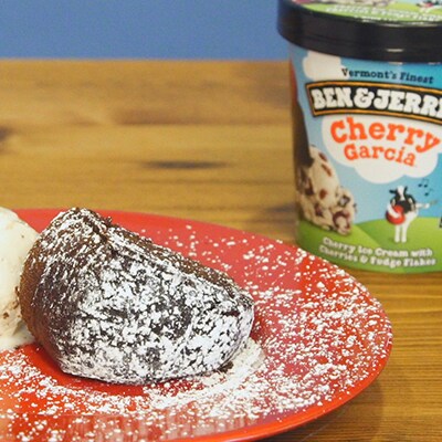 Chocolate bundt cake made with Ben & Jerry's ice cream. Dusted with confectioner's sugar.