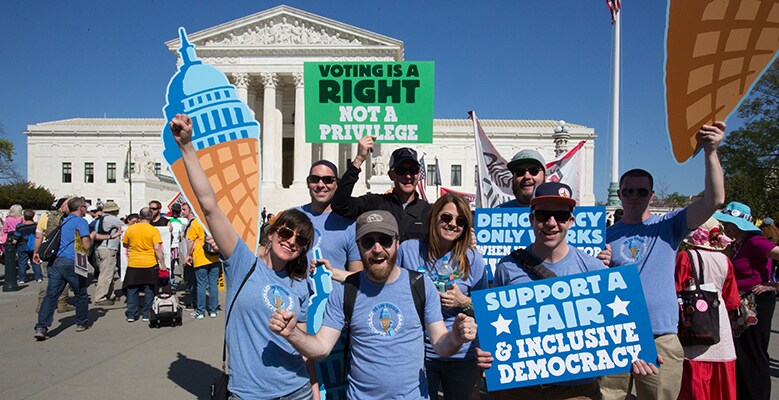 Ben & Jerry's employees with signs