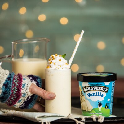Photo of Ben & Jerry's Vanilla ice cream pint next to the Very Merry Eggnog Milkshake.