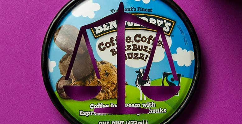 Pint of Ben & Jerry's ice cream with cutouts of the scales of justice.